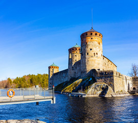 Beautiful view of Olavinlinna, Olofsborg ancient fortress, the 15th-century medieval three - tower...
