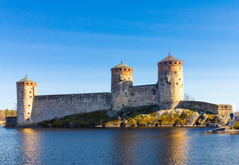 Beautiful view of Olavinlinna, Olofsborg ancient fortress, the 15th-century medieval three - tower...