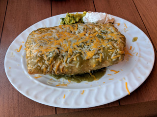 Wet Chimichanga/Fried Burrito with Guacamole and Sour Cream