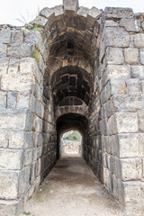 Fototapeta na wymiar Ruins of amphitheater in the ancient Roman city.