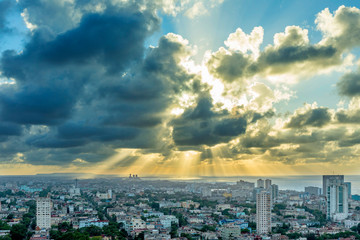 Fototapeta premium Havana Cuba rooftop view at Sunset with dramatic sky and clouds from FOCSA building.