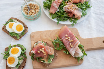 Antipasto platter cold meat with bread, eggs and salad
