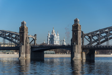 Obraz premium The Peter the Great Bridge against the background of the Smolny Cathedral. Saint-Petersburg, Russia