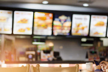 Fototapeta Blur image of fast food restaurant, use for defocused background. obraz