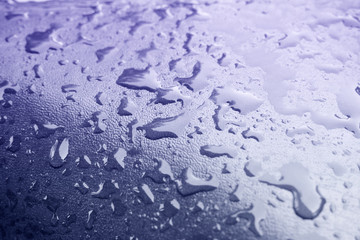 Water droplets texture on blue background