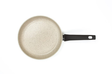 Photo of a bright ceramic pan with a black handle, isolated on a white background.