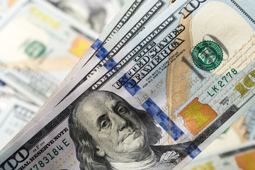 American dollars. A stack of hundred dollar bills. Close up