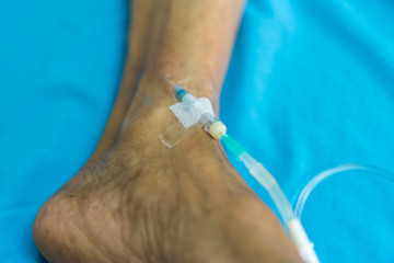 Patient with saline intravenous in the hospital