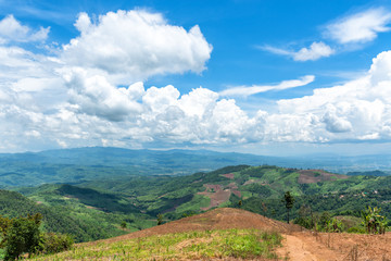 Mountain forest valley and cloud blue sky. Doi chang in Chiang Rai, Thailand.
