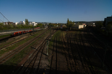 Fototapeta na wymiar A lot of tangled rail rails, top view. Near the old main station of stuttgart, hauptbahnhof