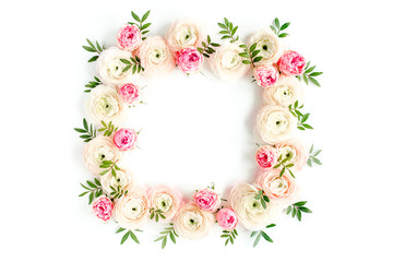 Floral pattern frame made of pink ranunculus and roses flower buds on white background.  Flat lay, top view floral background.