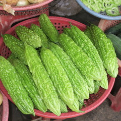 Momordica charantia.bitter cucumber, fruit from Asia, market in Vietnam