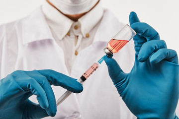 Filling up syringe with medicine