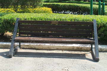 Close-up of an empty wooden bench