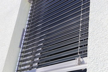 Window with external venetian blind, exterior shot