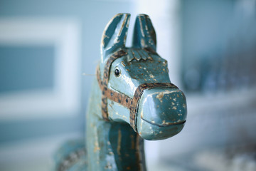 closeup.wooden horse on the background of a child's room