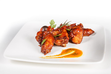 Food on white plate. Grilled meat.