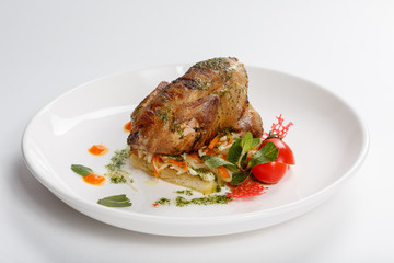 Food on white plate.  Grilled meat. Fried chicken.