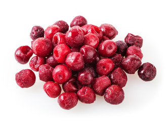 Heap of frozen cherry berries isolated on white background