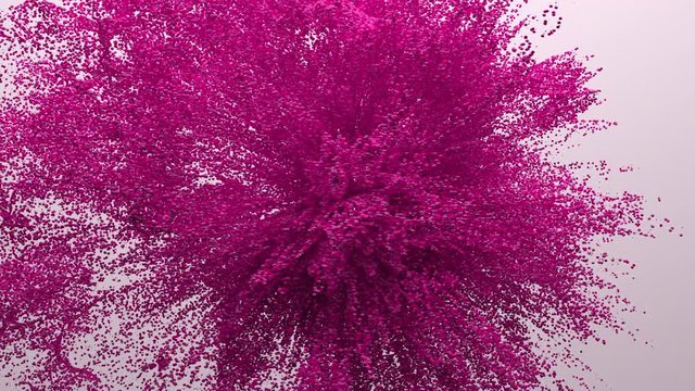 Abstract violet dust powder explosion in slow motion. 4k render animation.