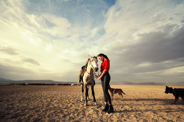 white horse and beautiful young woman. Fashion model with her white horse, Freedom, happiness, summer. Love 