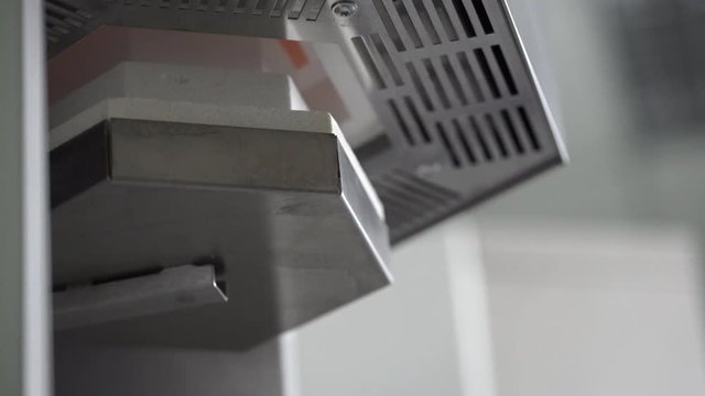 Closeup view at drying process in dental oven