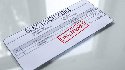 Final reminder seal stamped on electricity bill, payment for services, tariff