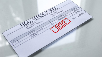 Household bill debt, seal stamped on document, payment for services, tariff