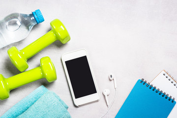 Finness background with sport equipment top view.