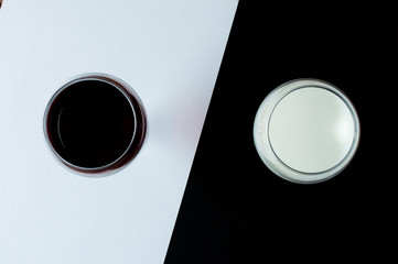 milk and wine on a black white background