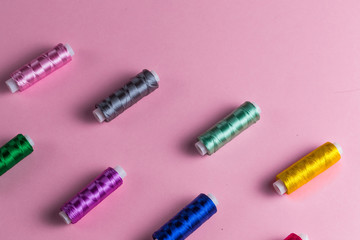 a set of colorful threds for sewing. copy space.