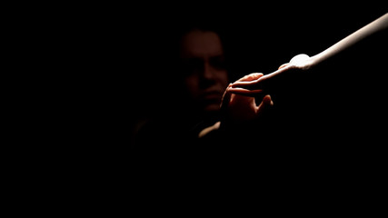 Depressed abandoned female taking hand offering help and changes, belief concept