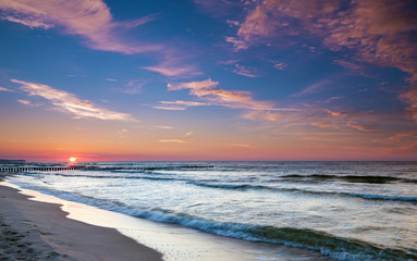 Sunset and dramatic sky over the Baltic Sea