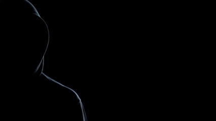 Silhouette of hooded man on black background, template for crime statistic