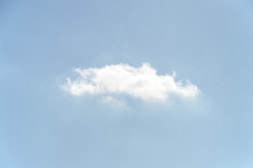 One cloud isolated on blue sky background