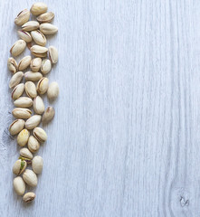 Healthy food  for background image close up pistachios nuts. Texture Nuts on top view mock up