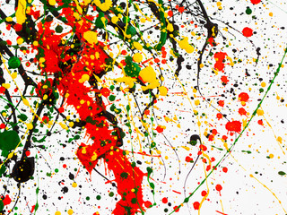 splashes on red and black and green and yellow paint
