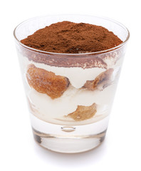 Classic tiramisu dessert in a glass isolated on a white background with clipping path