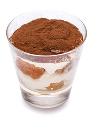 Classic tiramisu dessert in a glass isolated on a white background with clipping path