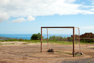 Fototapeta na wymiar Abandoned football field with an old goal in rural environment above sea on the island of Tenerife, Spain, Europe.