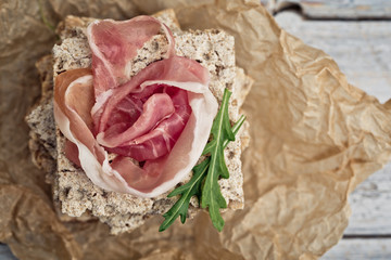 Crispbread with slices of dried Ham