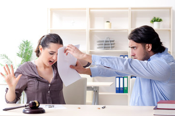 Fototapeta premium Young family in marriage divorce concept 