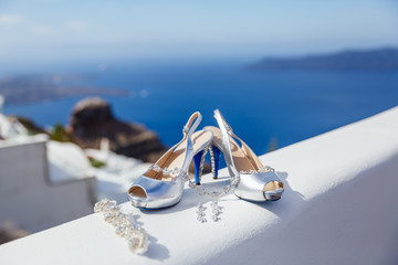 White wedding shoes and jewelry