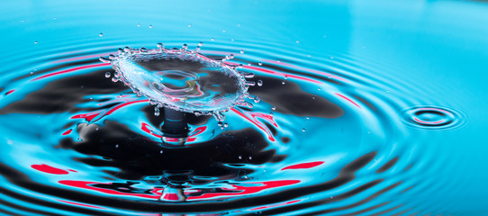 close up of a colorful water drop splash impact 
