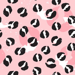 Vector seamless leopard pattern. Abstract black and white spots on pink background. Modern design.