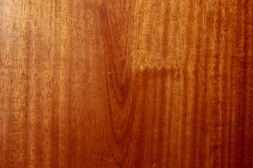 Naklejka premium Wood brown grain texture, top view of polished wooden table