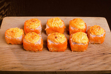 Sushi rolls with tuna and cheese. Baked Sushi Japanese cuisine in Ukrainian style. Seafood Restaurant