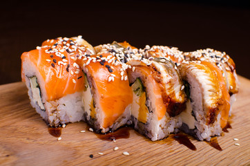 Traditional Japanese cuisine. Sushi restaurant menu. Rolls maki with tuna, eel and avocado.