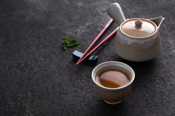 Obraz na płótnie Canvas space red chopstick with tea