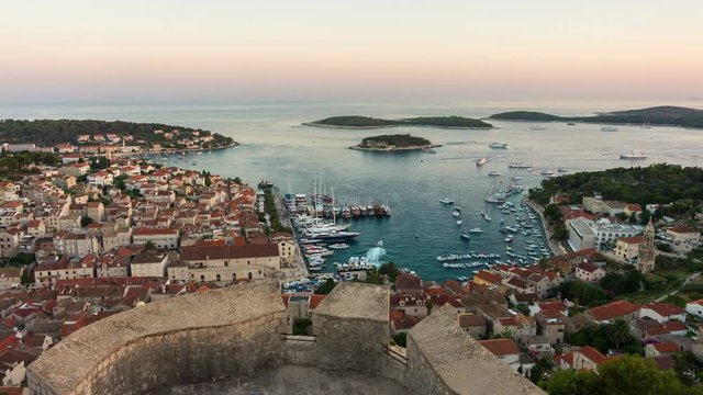 Day to Night Time Lapse of Hvar Town, Croatia. Hvar is a city and port on the island of Hvar, part of Split-Dalmatia, Croatia. Hvar has a history as center for Croatia trade, culture and travel.